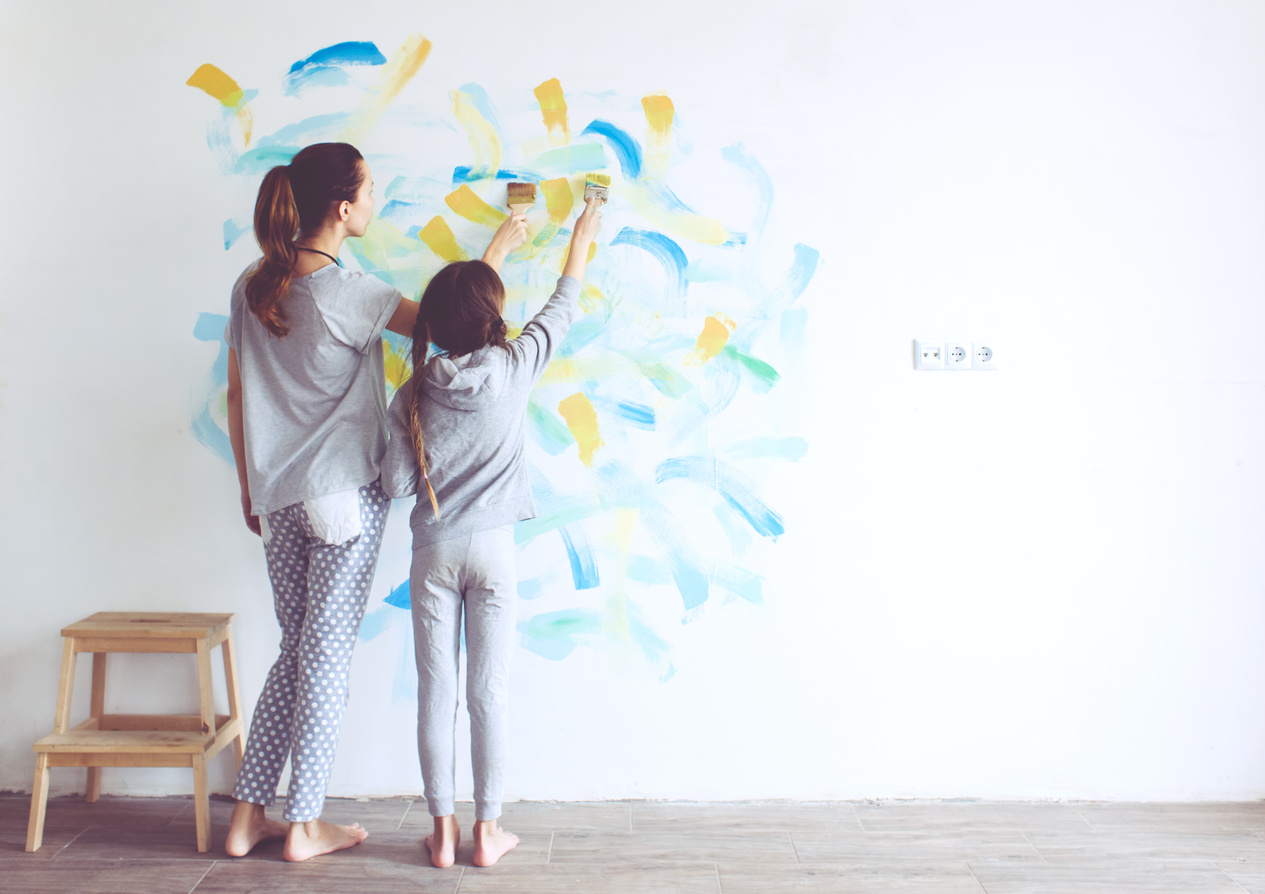 Child Painting Wall
